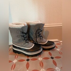 Sorel Caribou Black and White Winter Boots